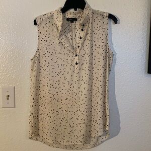 Polka dot ruffled neckline sheer tank